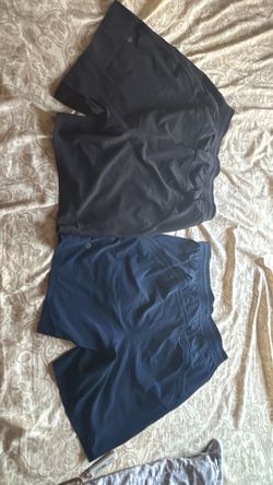 Used Black and Navy blue pace breaker shorts size small