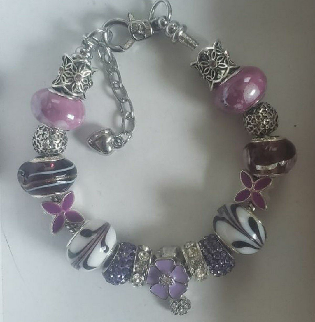 Purple charm bracelet 1 for $15 or 2 for $25