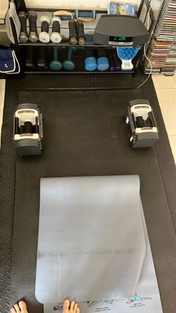 Adjustable dumbbells power block sport 9.0 go from 5 pounds to 50 pounds in 2 1/2 pounds increments