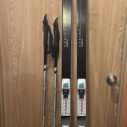 Karhu Kinetic Cross country skis with metal edges system, NNN BC bindings ,and poles.