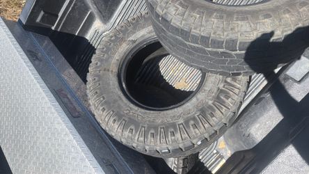 2 Bridgestone and 2goodyear wranglerLT285/76R16