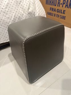 Gray leather stools with white stitching (2)