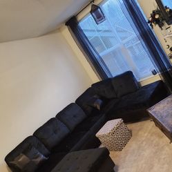 Midnight Black Microfiber Sectional Couch And Ottoman