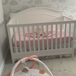 Unused Crib + Mattress 