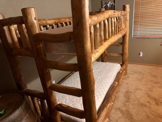 Rustic log bunk bed
