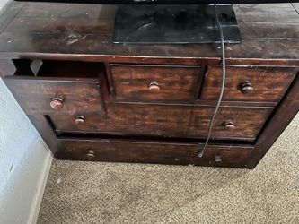 Dark Wood Dresser with Multiple Drawers
