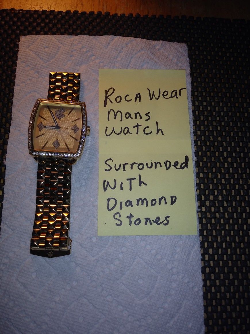 Roca Wear Man's Watch. Not Working. Need Battery. The Watch Is In Awesome Condition No Scratches On The Front. All Sales Final.