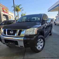 WORK TRUCK ,WORK TRUCK 
2009 Nissan titan
Runs very good
Automatic 
Motor V8
scratches here and there ,but is a WORK TRUCK 
Current tags
smog done
CLE