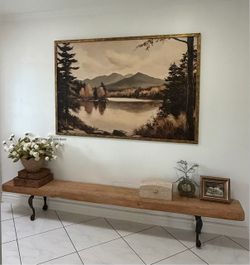 Earthy Chucky Wood Bench with Ornate Metal Legs