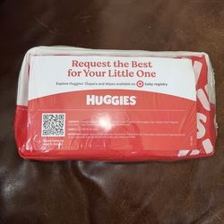Huggies Diaper Holder Bag with Handle, featuring the phrase "the snuggle is real". 