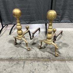 Antique Andirons a to support logs in a fireplace