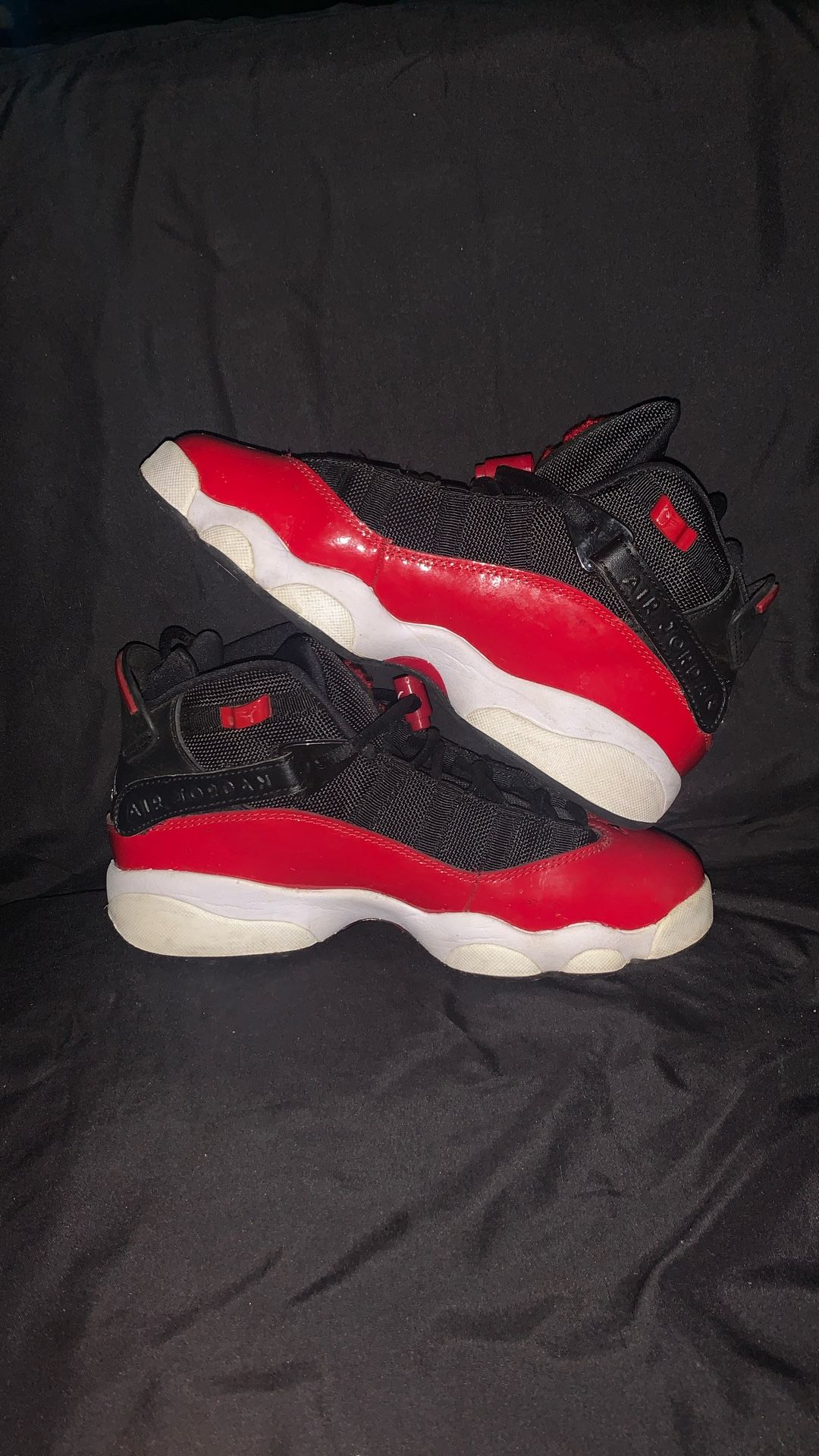 Jordan 6 Rings in a black, red, and white colorway.