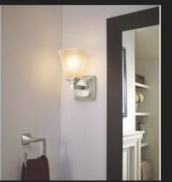 Umbra Zen Towel Ring in a nickel finish. 