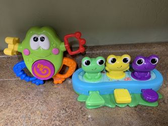 Babb Toys $5 each Bright Starts Bop and giggle frogs activity toy with melodies Fisher price go baby go silly sounds frog