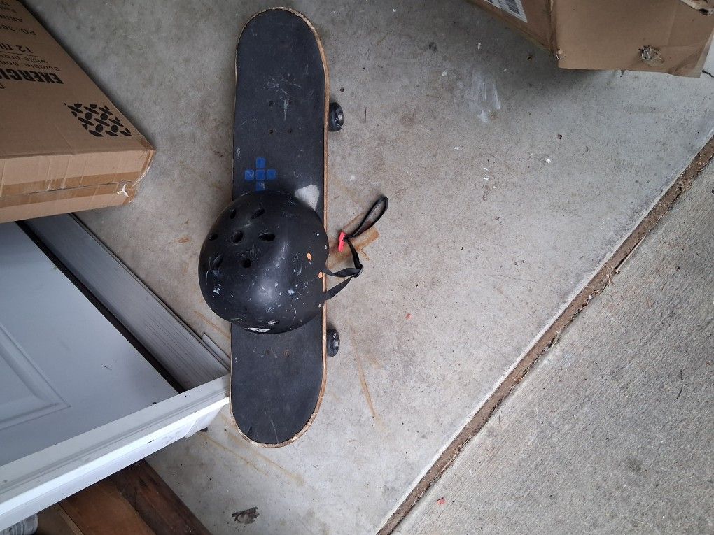 Skate Board With Large Helmet