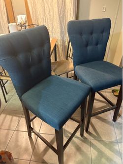 Navy blue high chairs for bar area