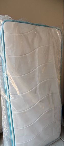 2 XL  twin mattress , pending pick up