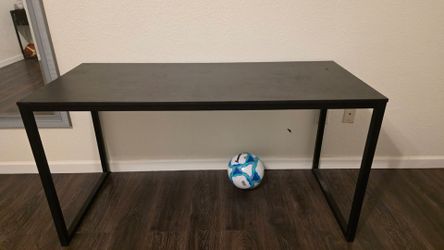 Black wooden desk