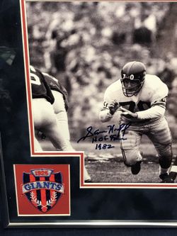 Sam Huff, NY Giant HOF, autographed 8x10 photo in a 11x14 Frame, Nice piece of the Giant Legend! COA as well!
