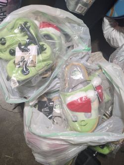 Many different size Yoda slides some with Santa hat
