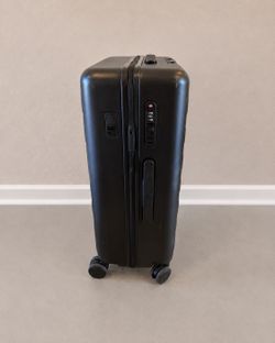 20” Black Carry-On Spinner Suitcase