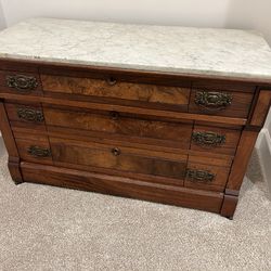 Victorian-era marble-top chest of drawers Eastlake style
