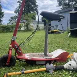 Razor scooter frame with seat and spare engine and chain
