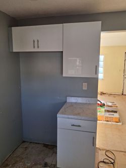 White  kitchen cabnets  and top