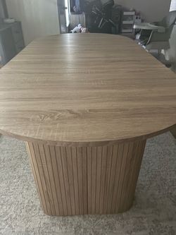 Oval Wood Dining Table with Fluted Pedestal Base