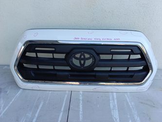 2016-THRU 2023 TOYOTA TACOMA FRONT GRILLE OEM USED