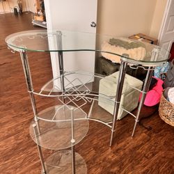 Glass chrome home bar with wine rack + matching side table