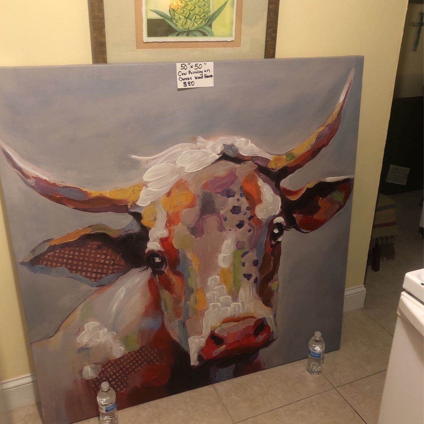 Very large colorful cow painting canvas on wood frame originally $300 from Kirkland letting this go for a fraction of the cost to many memories herepe