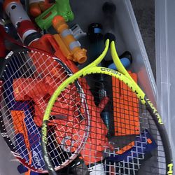 Nerf Guns And Tennis Rackets