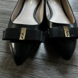 Cole Haan black flats 