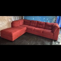 Red couch with pullout bed great condition clean we sell all the time delivery $40 local