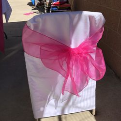 Bows for party chairs.