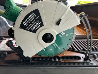 New Hoteche multi-cutting machine has a 15A 2.4HP motor and a 14-inch diamond blade. This green and grey corded power tool includes a water feed attac