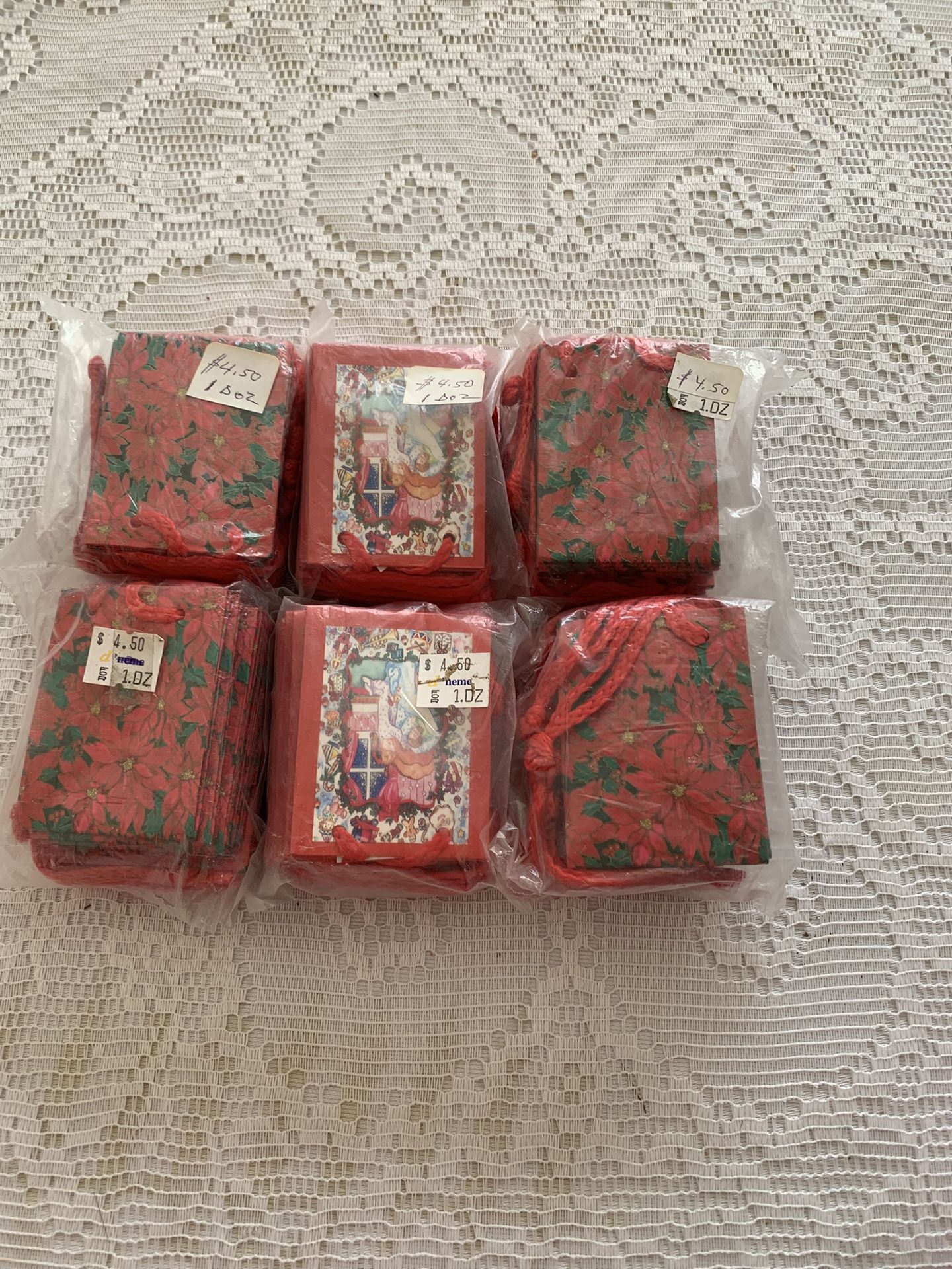 Small RED CHRITSMAS RED. GIFT BAG WITH GIFT TAG FOR SMALL PRESENTS. 3”L X 2 2/4”W 72 At $2.25 $13.50
