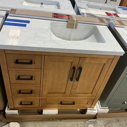 36” Bathroom Vanity in teak , single sink soft close solid wood with vanity top in white  $575  Luke’s liquidations warehouse Address:  2434 N Forsyth