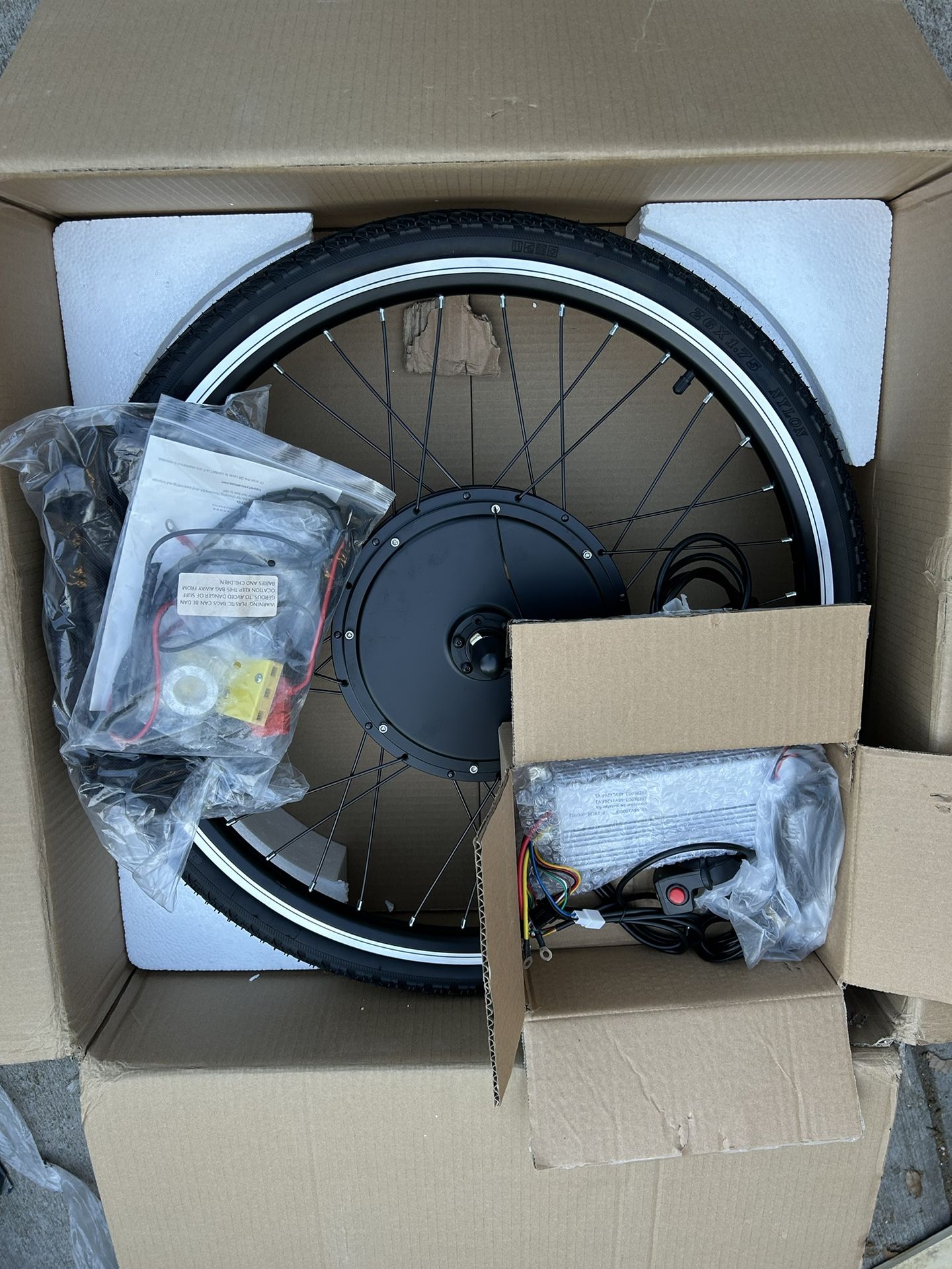 Brand new 26” electric bicycle wheel kit for $140. 
