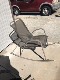 A Set Of Patio Rocking Chairs