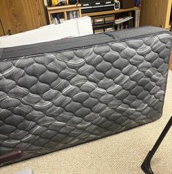 Restonic® Paxtyn 13" Wrapped Coil Firm Tight Top Double-Sided Twin Mattress
