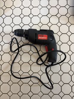 Drill master 3/8” variable speed reversible drill