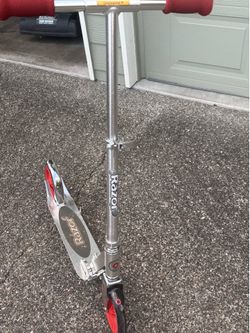 2 scooters for sale.  Razor one is 50, the other one is 25.