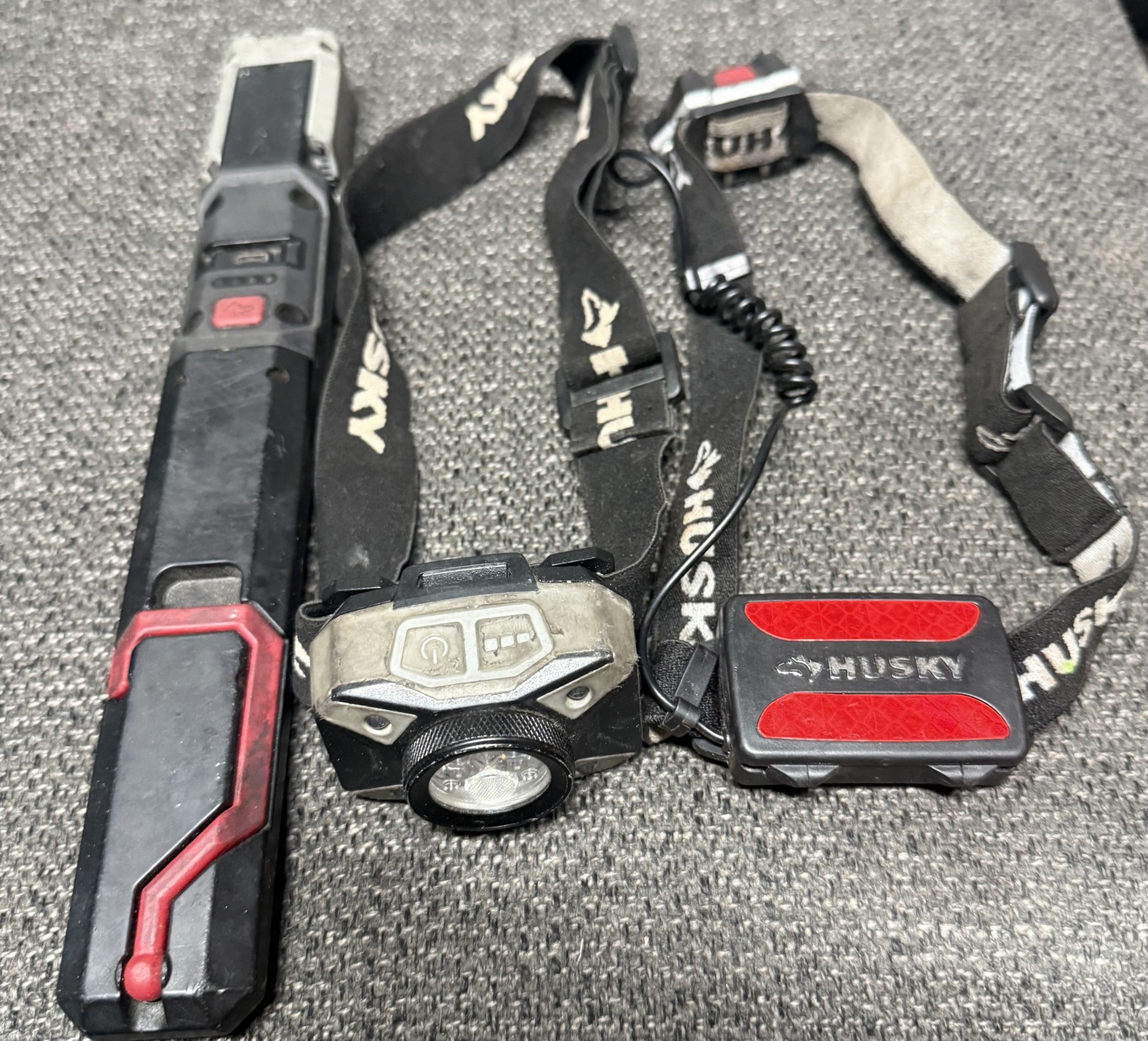 Husky headlamp and a Husky flashlight.