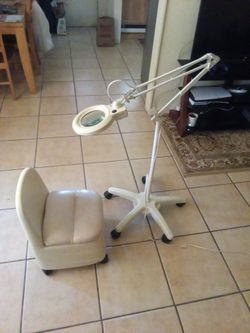 Manicure chair and magnifying light