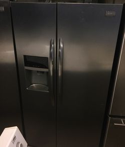 Frigidaire gallery stainless side by side refrigerator/ ice and water dispenser/ warranty