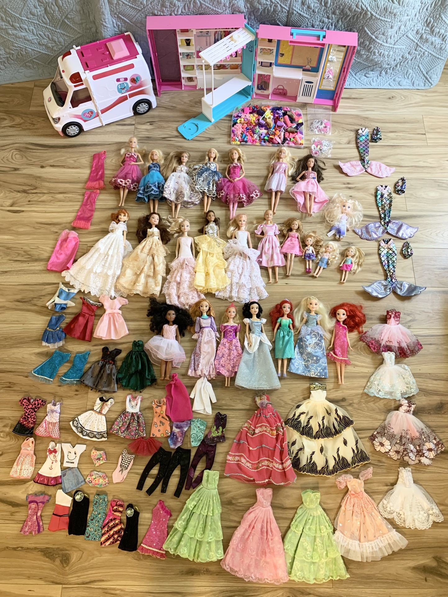 $100 for all in the picture , Barbies, dresses, Shoes, Accessories , Barbie’s ambulance and clothes