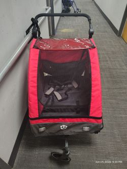 2 - in - 1 bike trailer and jogger stroller.