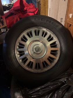 15 inch Cadillac rims and tires for an old school car